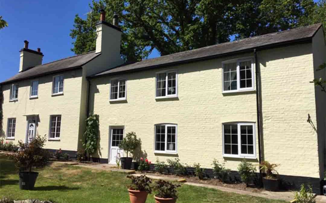 Exterior painting of 250 year old cottage